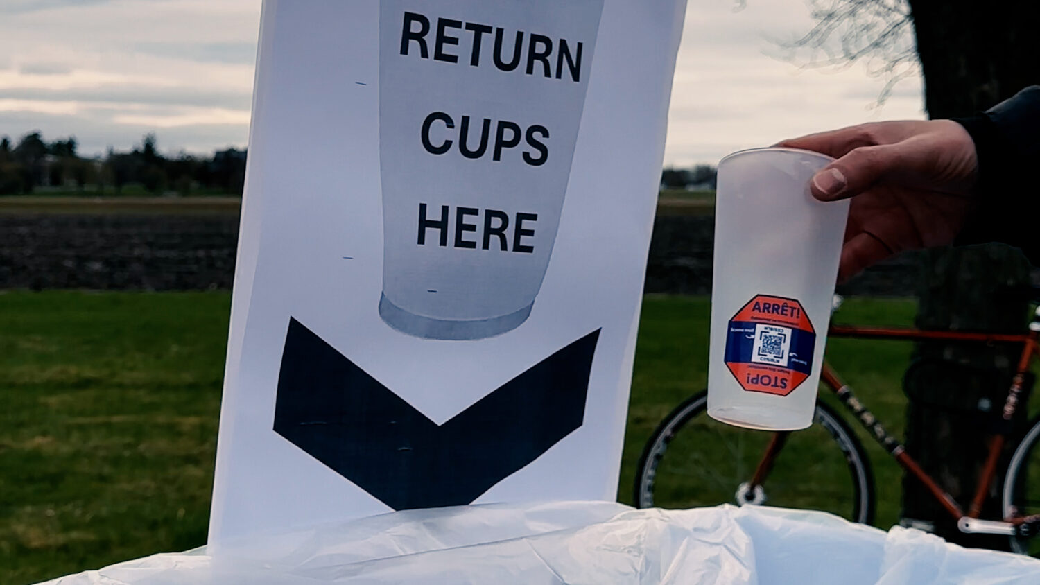 A sign reads "Return cups here". Photo by Craig Conoley/EnviroCentre.