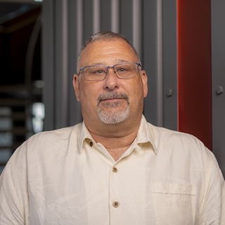 Portrait photo of Chris Delben.