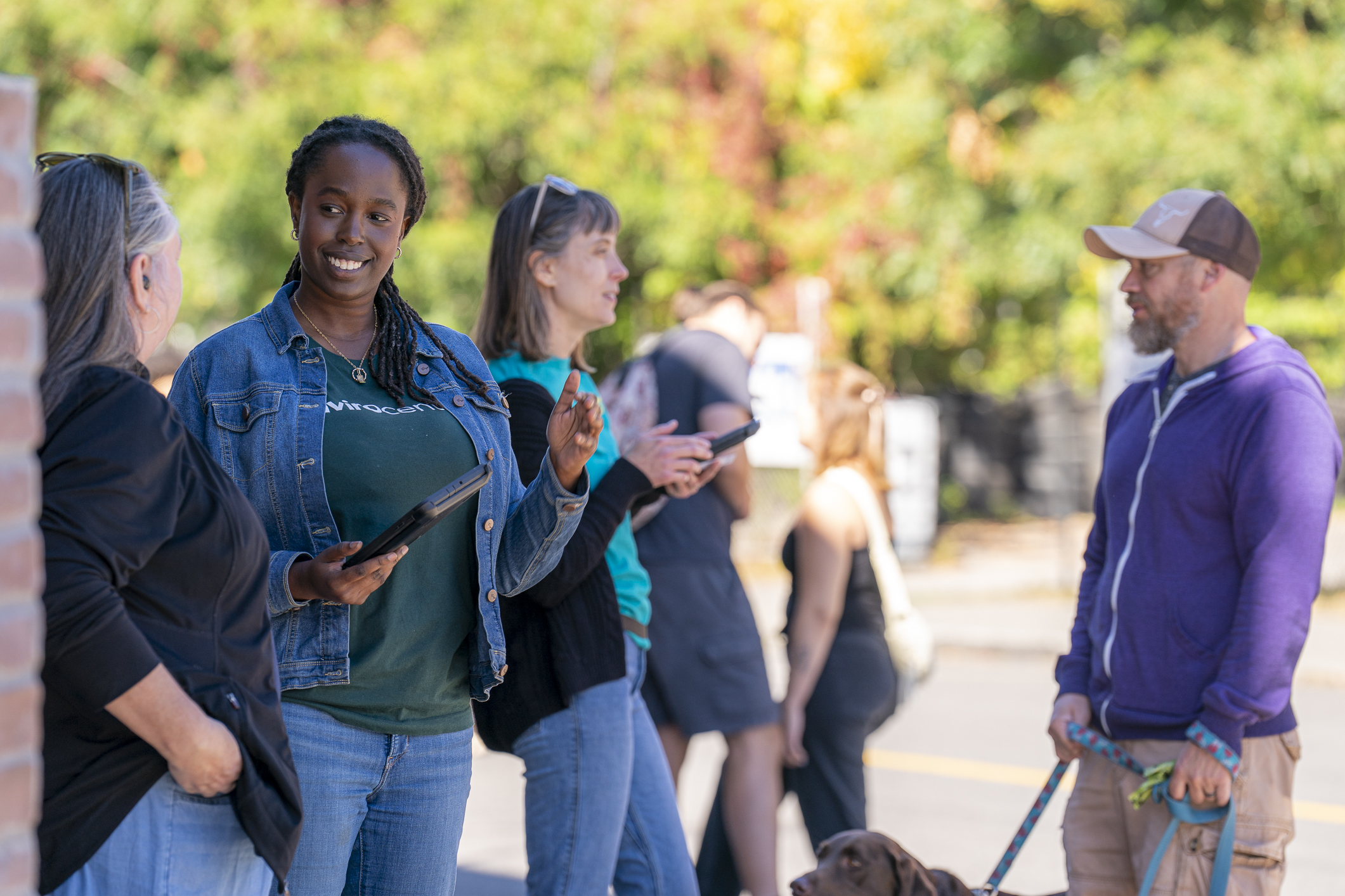 Image of EnviroCentre outreach staff conducting surveys at a community event